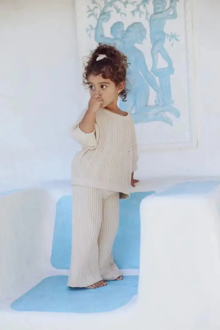 2 year old with Ribbed knit Creme pants