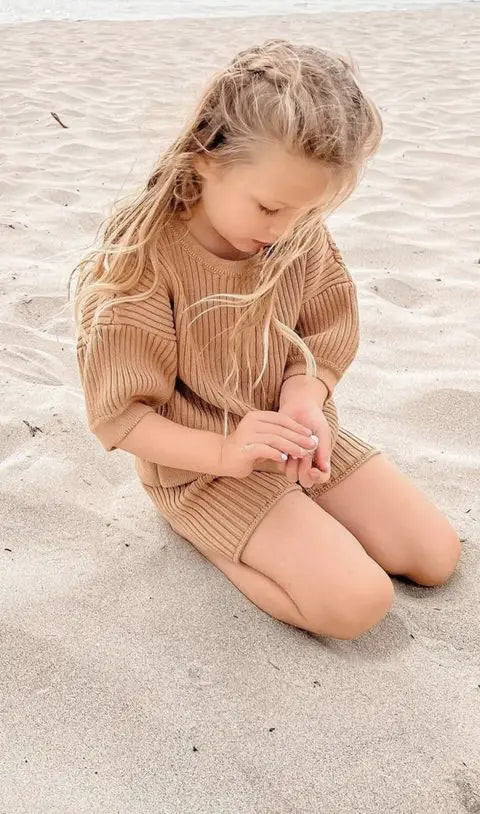 Girl on Beach in Cocoa Ribbed Knit Shorts
